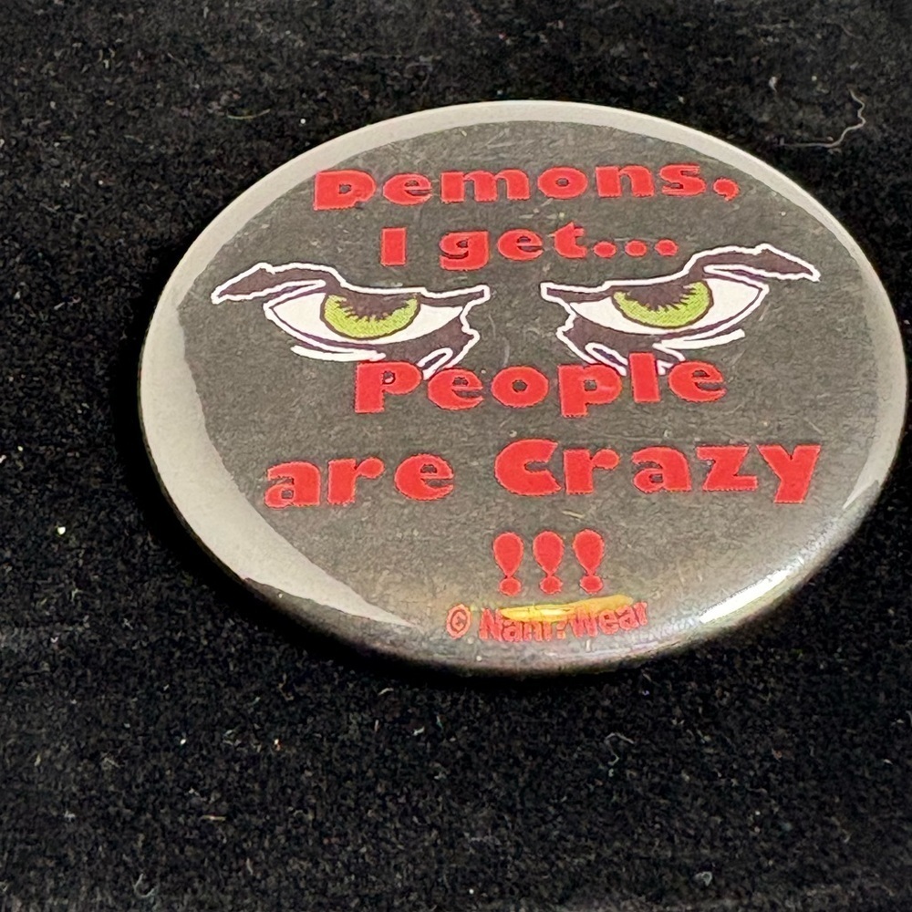 Black Button with Demon Eyes “Demons I Get, But People Are Crazy”